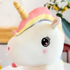 Peluche licorne assise