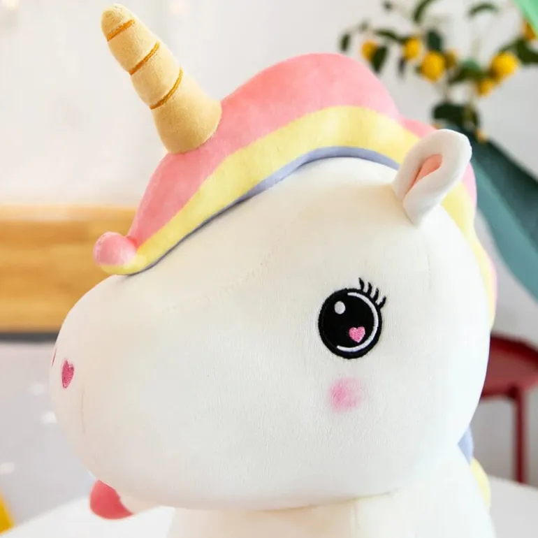 Peluche licorne assise
