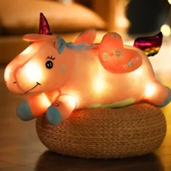 Peluche licorne lumineuse rose